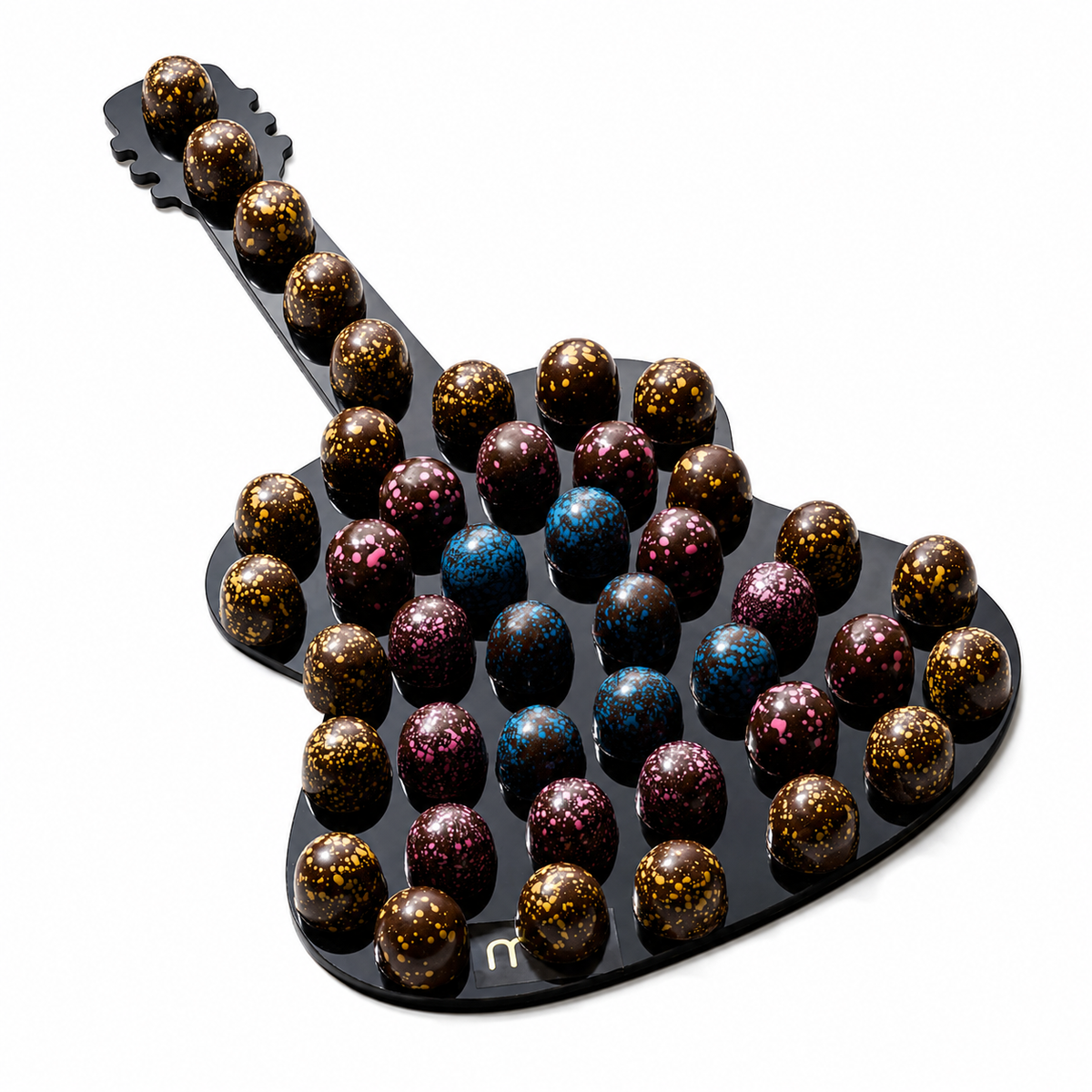 Chocolate Balls on Acrylic Violin