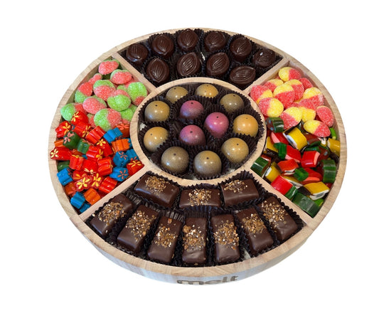 Mix chocolate candy round wooden platter
