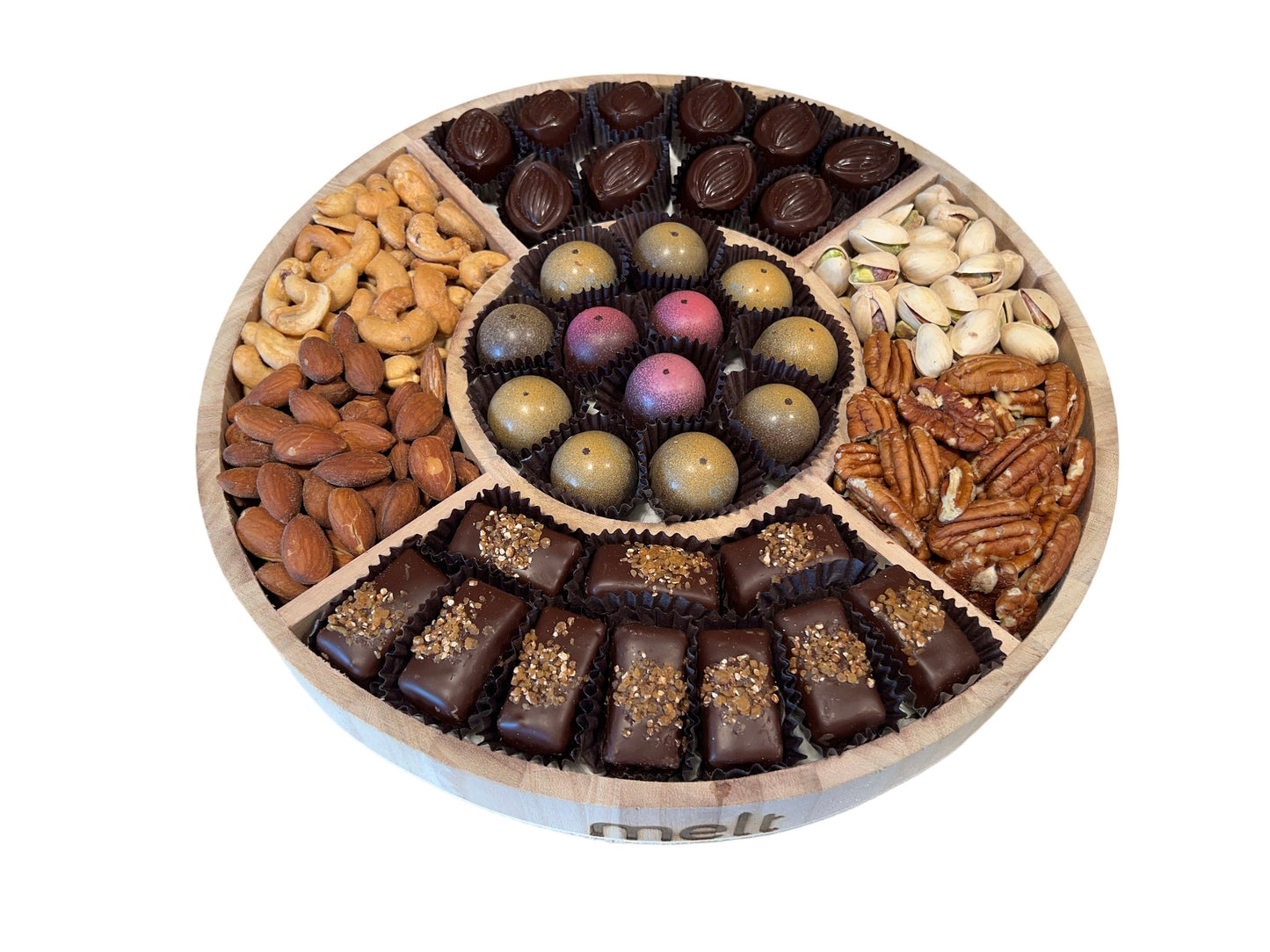 Mix chocolate nuts round wooden platter