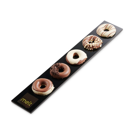 Chanukah dairy chocolate donuts on acrylic tray